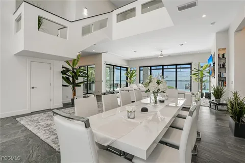 a large white bed in a white room