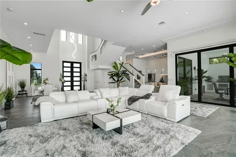 a kitchen with sink and stove