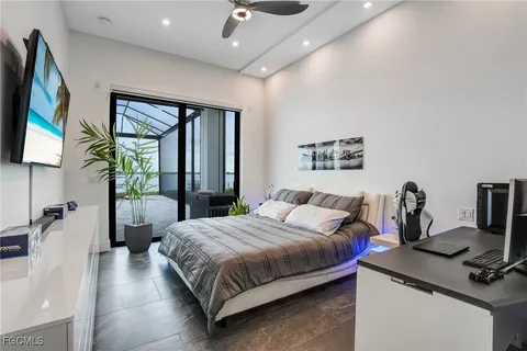 a living room with a large window and a table