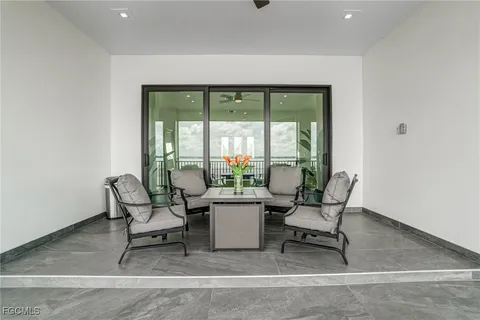 a view of a porch with wooden floor