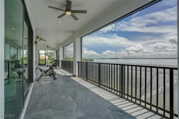 a view of a garage with a bike and car