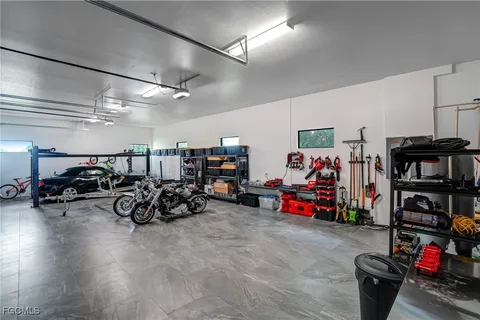 a building outdoor space with patio furniture and potted plants