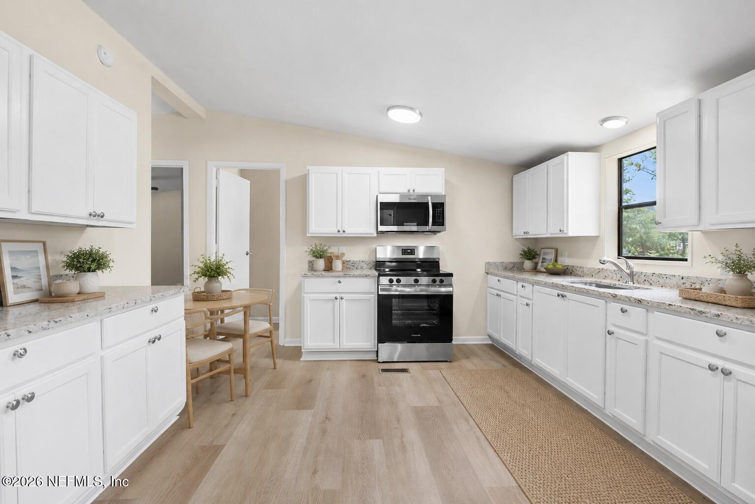 85110 Theresa Road Yulee, FL 32097 - Photo 5 of 43 07_Staged_Kitchen_Main