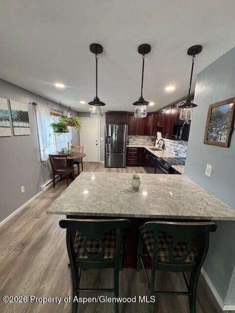 495 East 11th Street Craig, CO 81625 - Photo 4 of 12 a view of a dining room with furniture