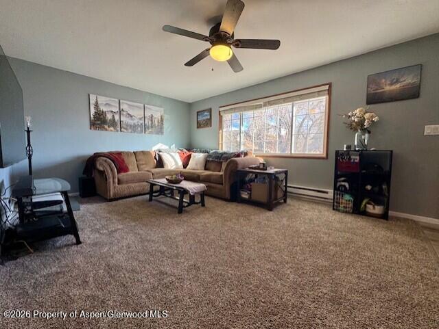 495 East 11th Street Craig, CO 81625 - Photo 6 of 12 a living room with furniture and a chandelier
