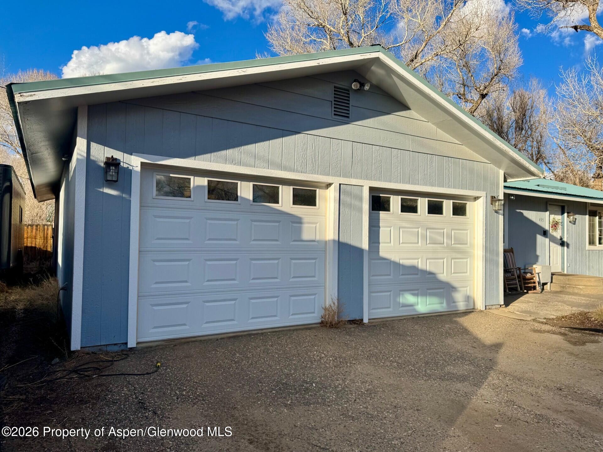 495 East 11th Street Craig, CO 81625 - Photo 10 of 12 a view of a house with a patio
