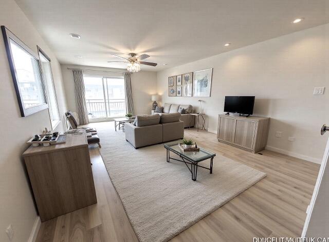 1947 Southwest Palm City Road, Unit G Stuart, FL 34994 - Photo 12 of 43 Living room staged