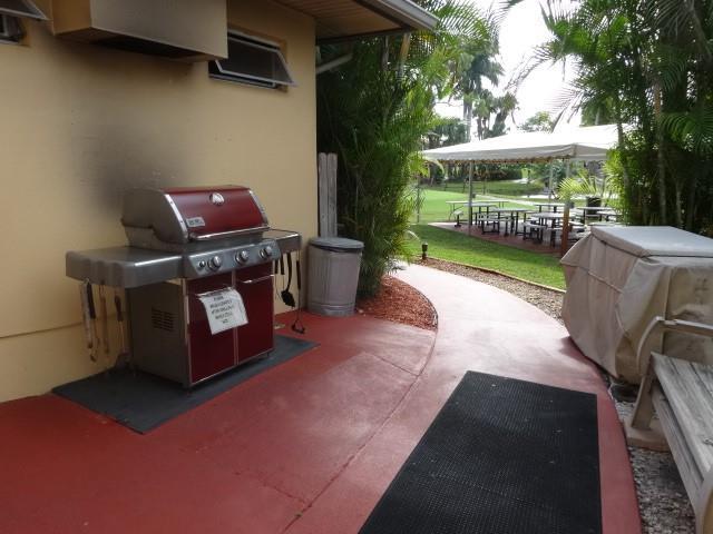 1947 Southwest Palm City Road, Unit G Stuart, FL 34994 - Photo 23 of 43 16 bar b q area