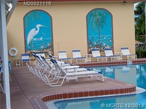 1947 Southwest Palm City Road, Unit G Stuart, FL 34994 - Photo 29 of 43 community pool side