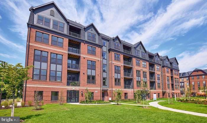 front view of a building with a yard