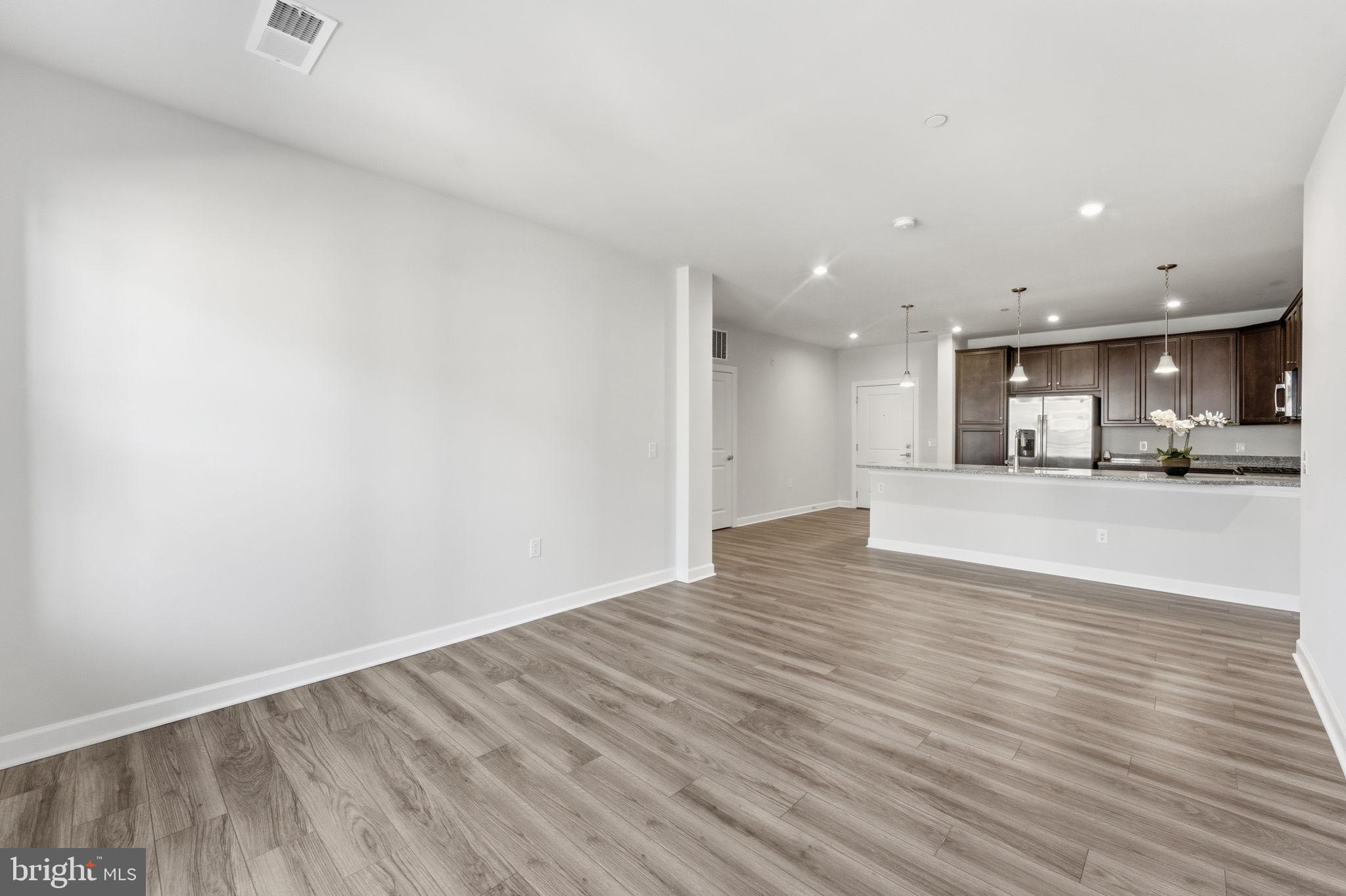 3925 Fair Ridge Drive, Unit 304 Fairfax, VA 22033 - Photo 15 of 44 a view of kitchen and kitchen with a sink