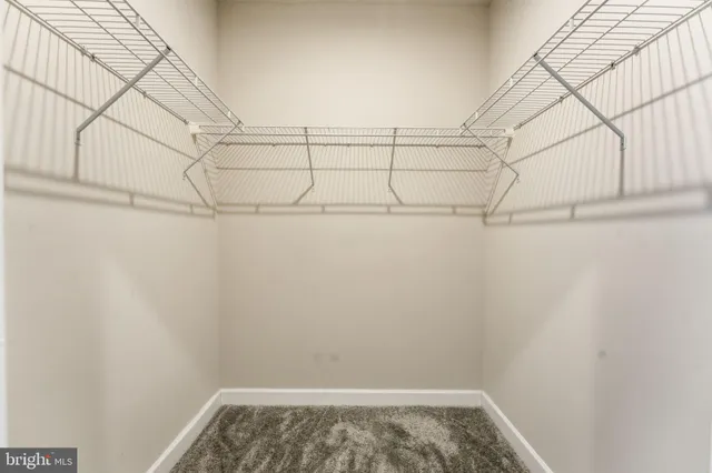 a view of a room with racks on the wall