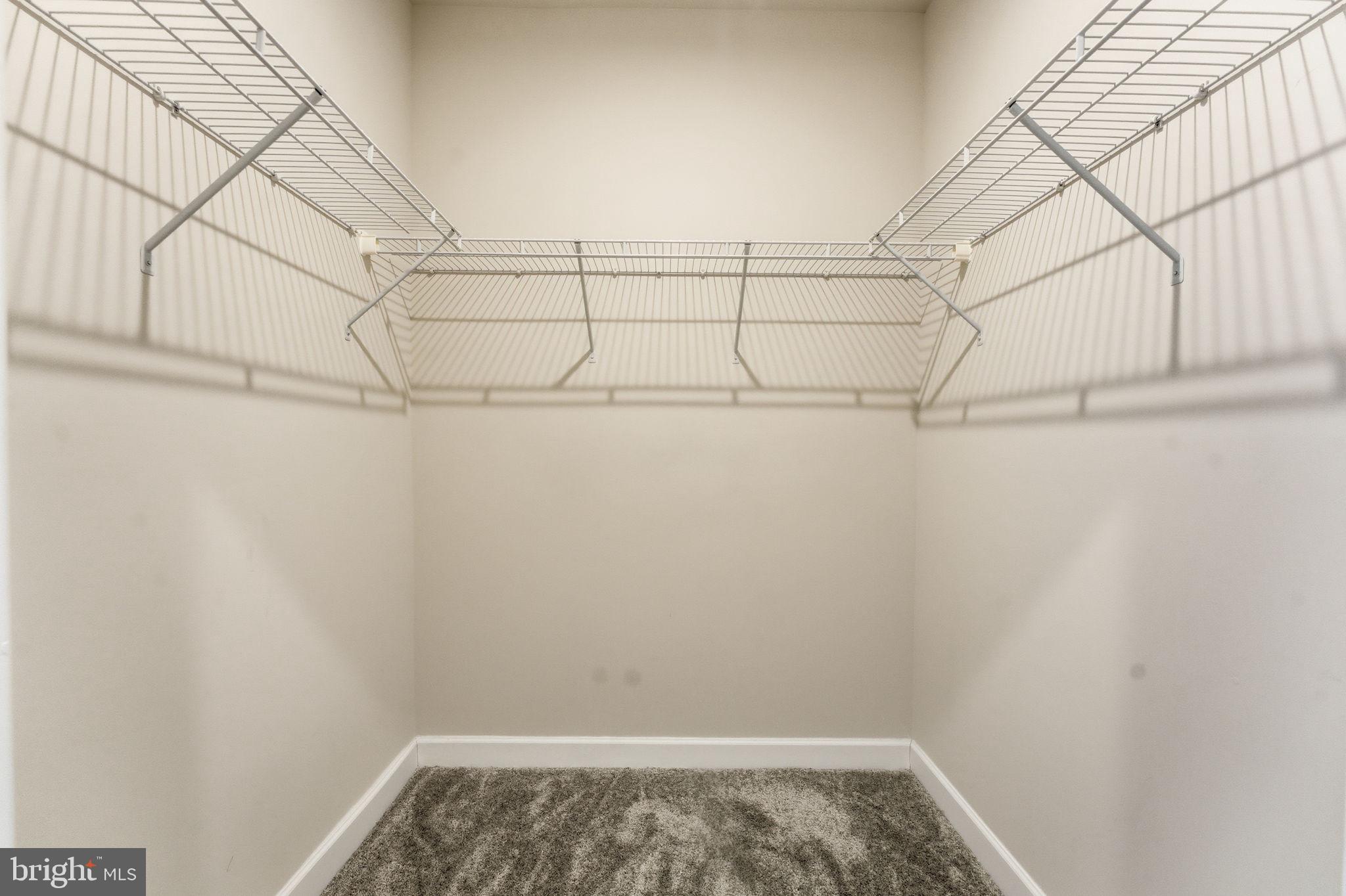 3925 Fair Ridge Drive, Unit 304 Fairfax, VA 22033 - Photo 29 of 44 a view of a room with racks on the wall