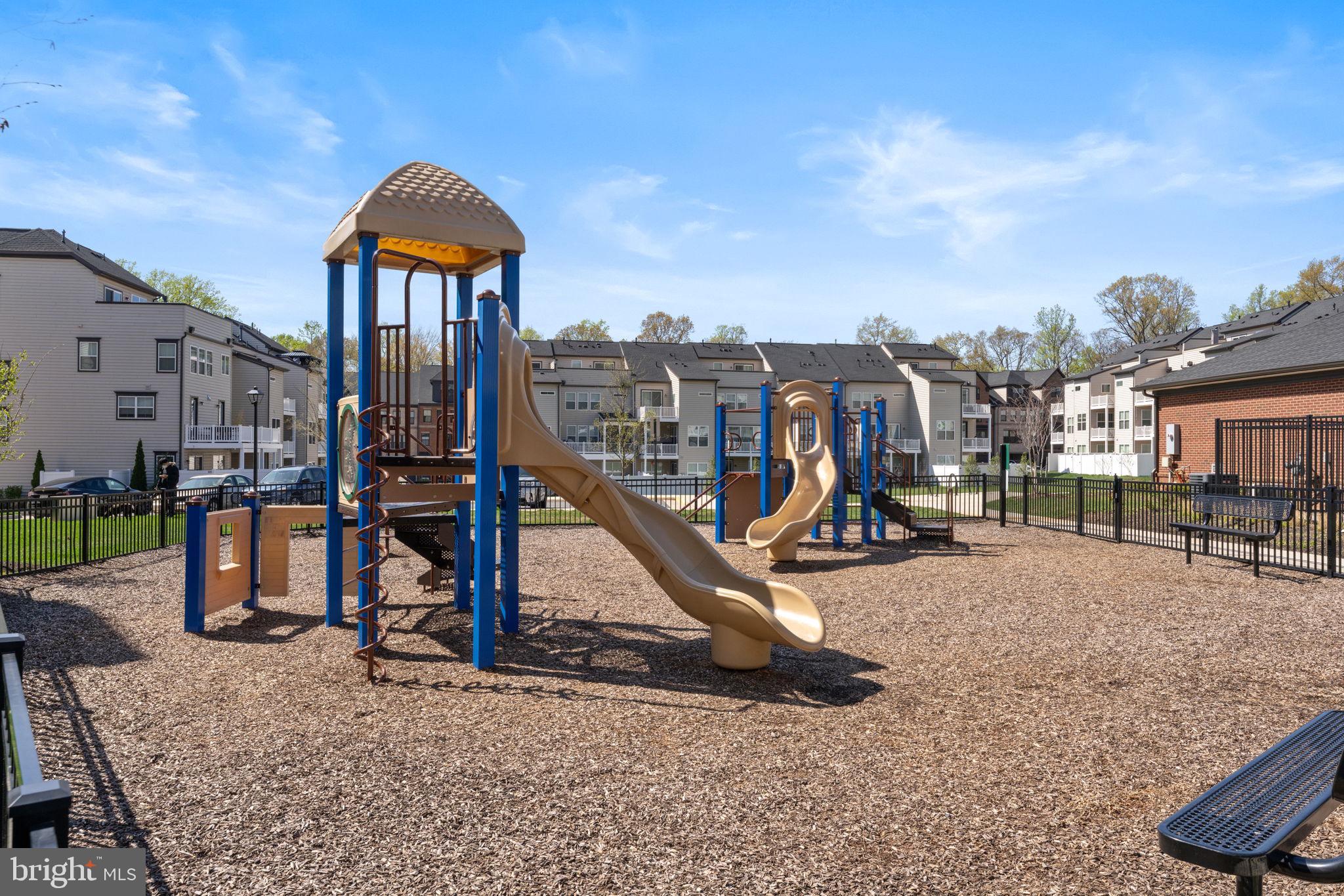 3925 Fair Ridge Drive, Unit 304 Fairfax, VA 22033 - Photo 41 of 44 a view of a house with a yard and potted plants