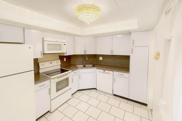 a view of a lake with a city