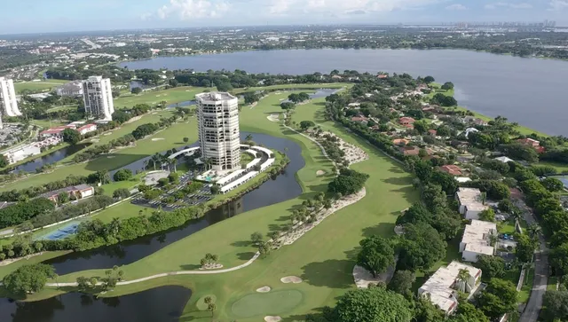 an aerial view of lake residential houses with outdoor space and lake view