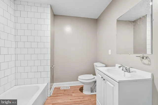 a bathroom with a sink and a bathtub