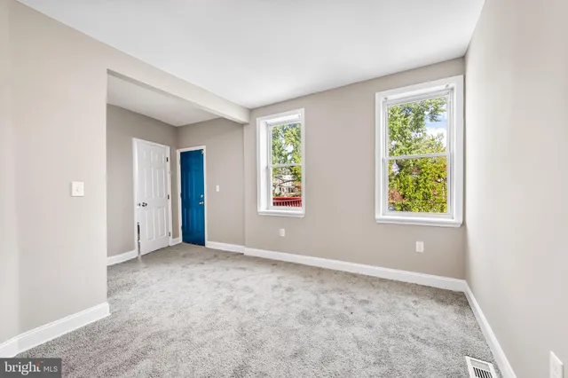 a view of an empty room with window