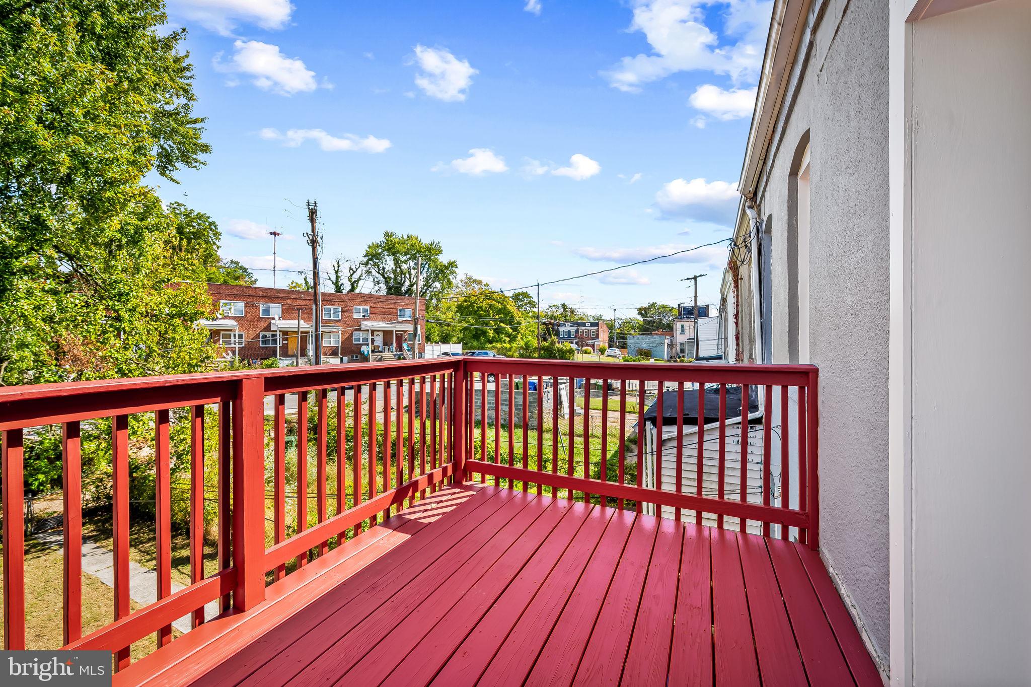 4021 Park Heights Avenue Baltimore, MD 21215 - Photo 25 of 32 a view of a balcony with wooden floor
