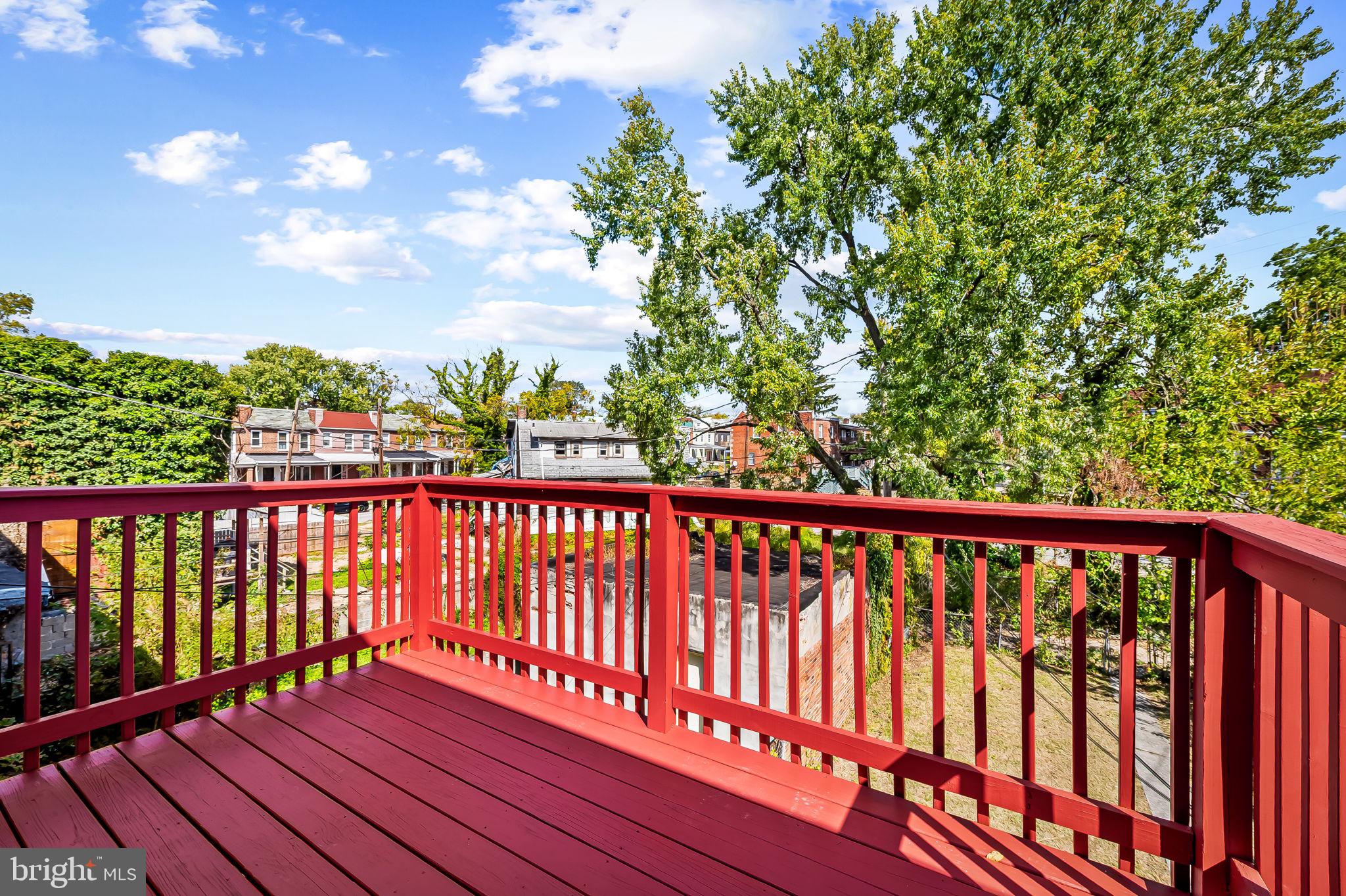4021 Park Heights Avenue Baltimore, MD 21215 - Photo 27 of 32 a view of balcony with wooden floor
