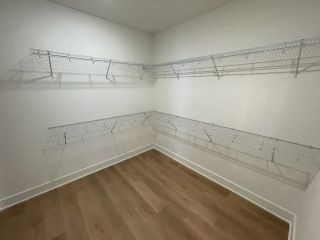 a view of a room with racks on the wall