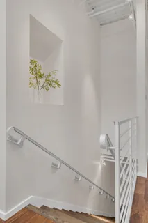 a view of an entryway with stairs