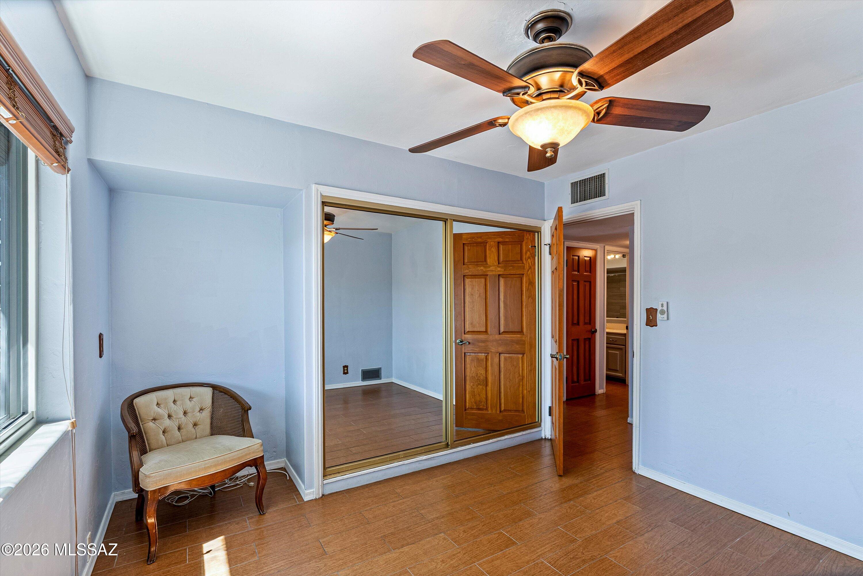 2107 East Lind Road Tucson, AZ 85719 - Photo 28 of 43 a view of a livingroom with a fan and a window