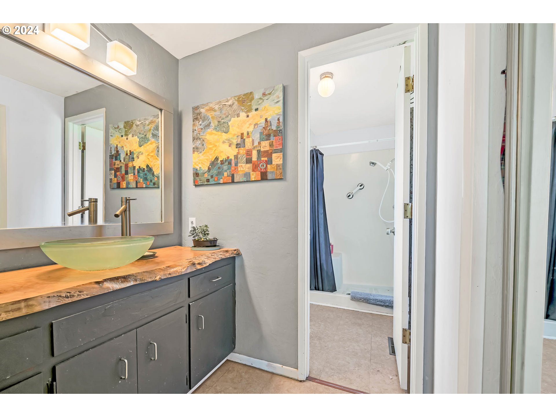 797 Prescott Lane Springfield, OR 97477 - Photo 26 of 43 a bathroom with a tub sink and mirror