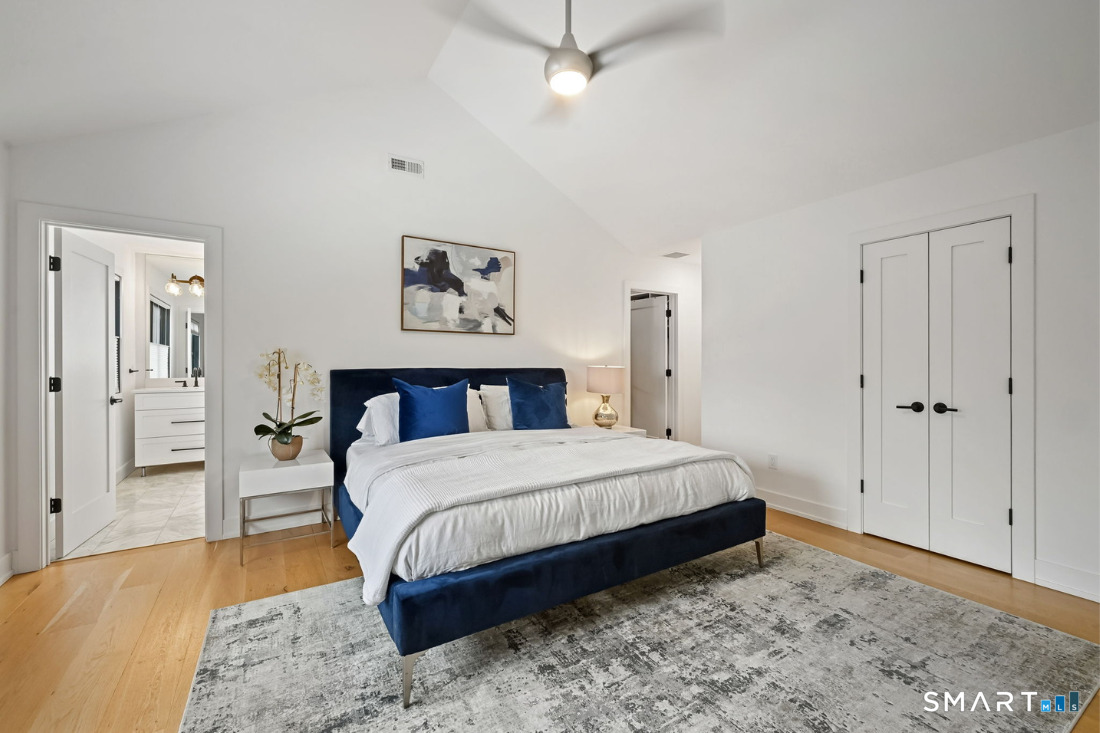 187 Catherine Terrace Fairfield, CT 06824 - Photo 25 of 40 Wide plank natural white Oak floors and modern ceiling fan light.