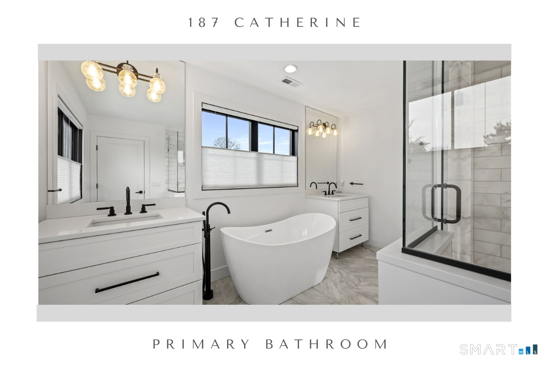 187 Catherine Terrace Fairfield, CT 06824 - Photo 26 of 40 Luxe full bath en suite with two vanities, freestanding soaking tub and oversized shower.