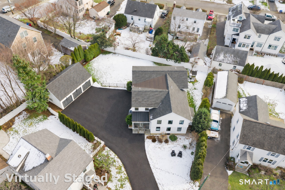 187 Catherine Terrace Fairfield, CT 06824 - Photo 39 of 40 Hard to pass-up double lot with plenty of parking, fenced rear yard, outdoor shower, expansive patio, beautiful landscaping, walkways and room for a pool!