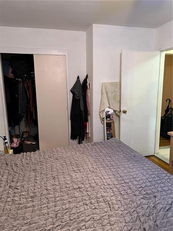 2400 East 3rd Street, Unit 529 Brooklyn, NY 11223 - Photo 7 of 7 a view of a bedroom with gym equipment