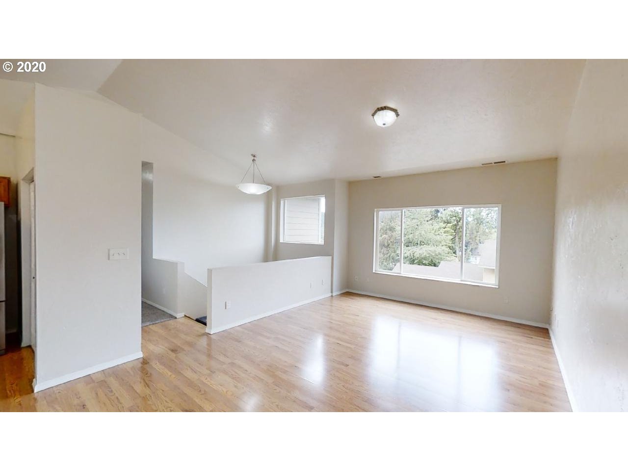340 Kalapuya Way Cottage Grove, OR 97424 - Photo 6 of 20 a open hall with a bench and potted plant