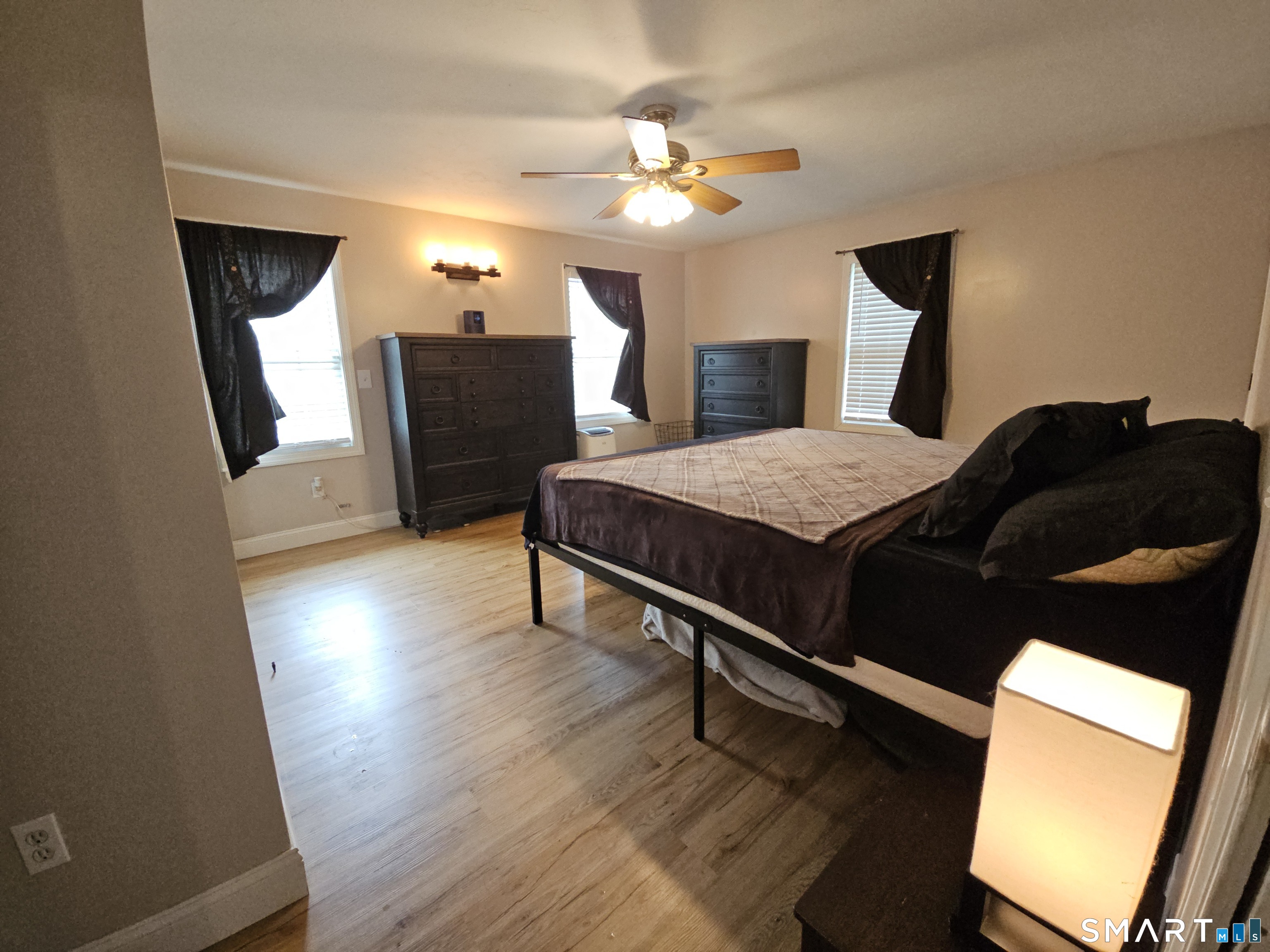 4 Breaults Landing Road Thompson, CT 06277 - Photo 16 of 39 a bedroom with furniture and a mirror
