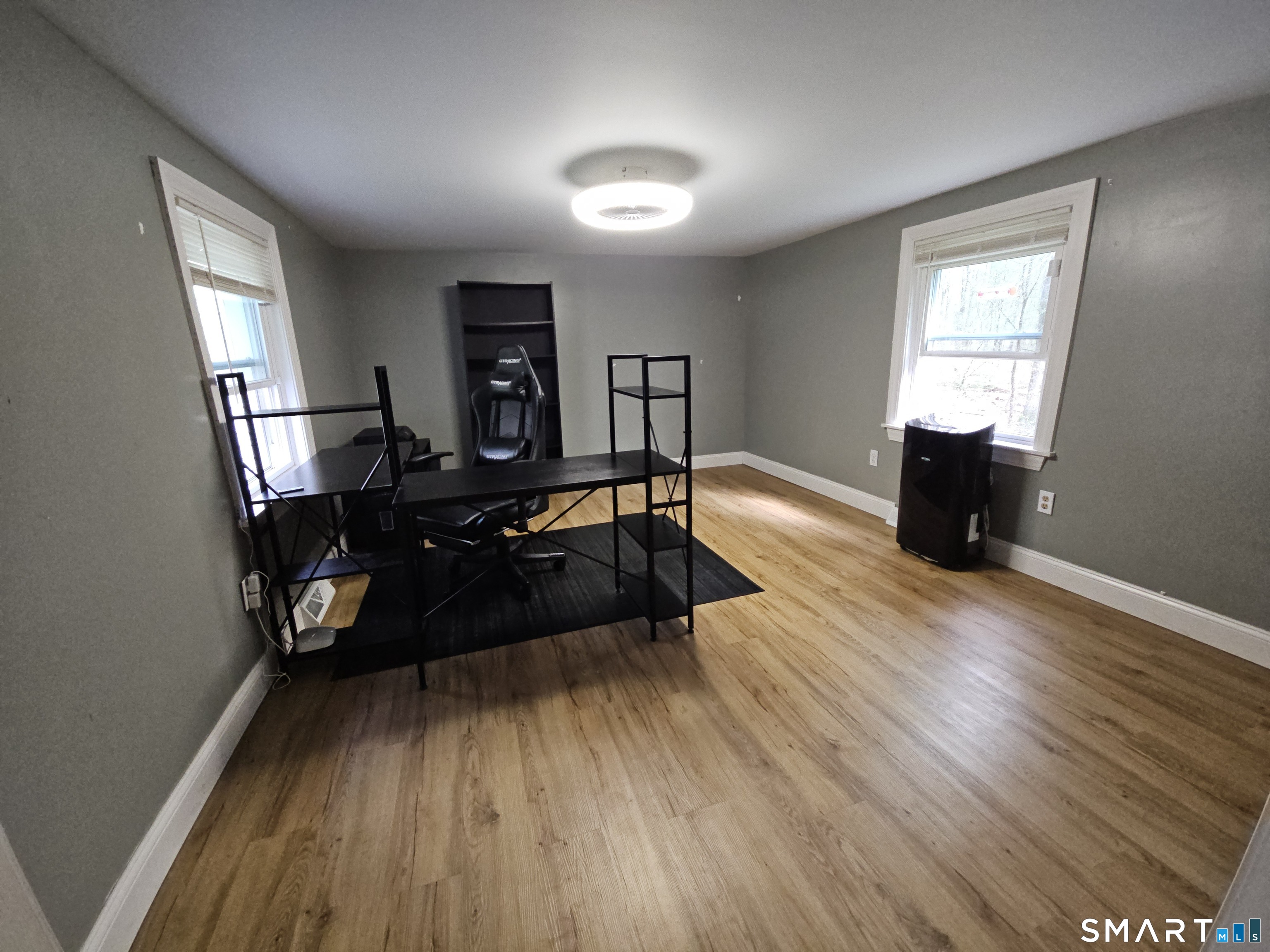 4 Breaults Landing Road Thompson, CT 06277 - Photo 21 of 39 a living room with furniture and a wooden floor