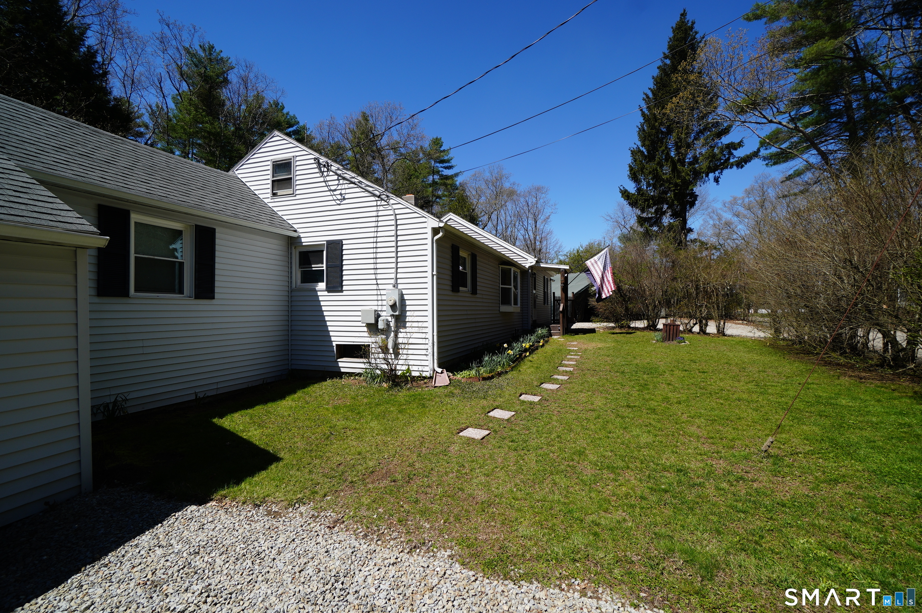 4 Breaults Landing Road Thompson, CT 06277 - Photo 3 of 39 a view of a backyard of the house