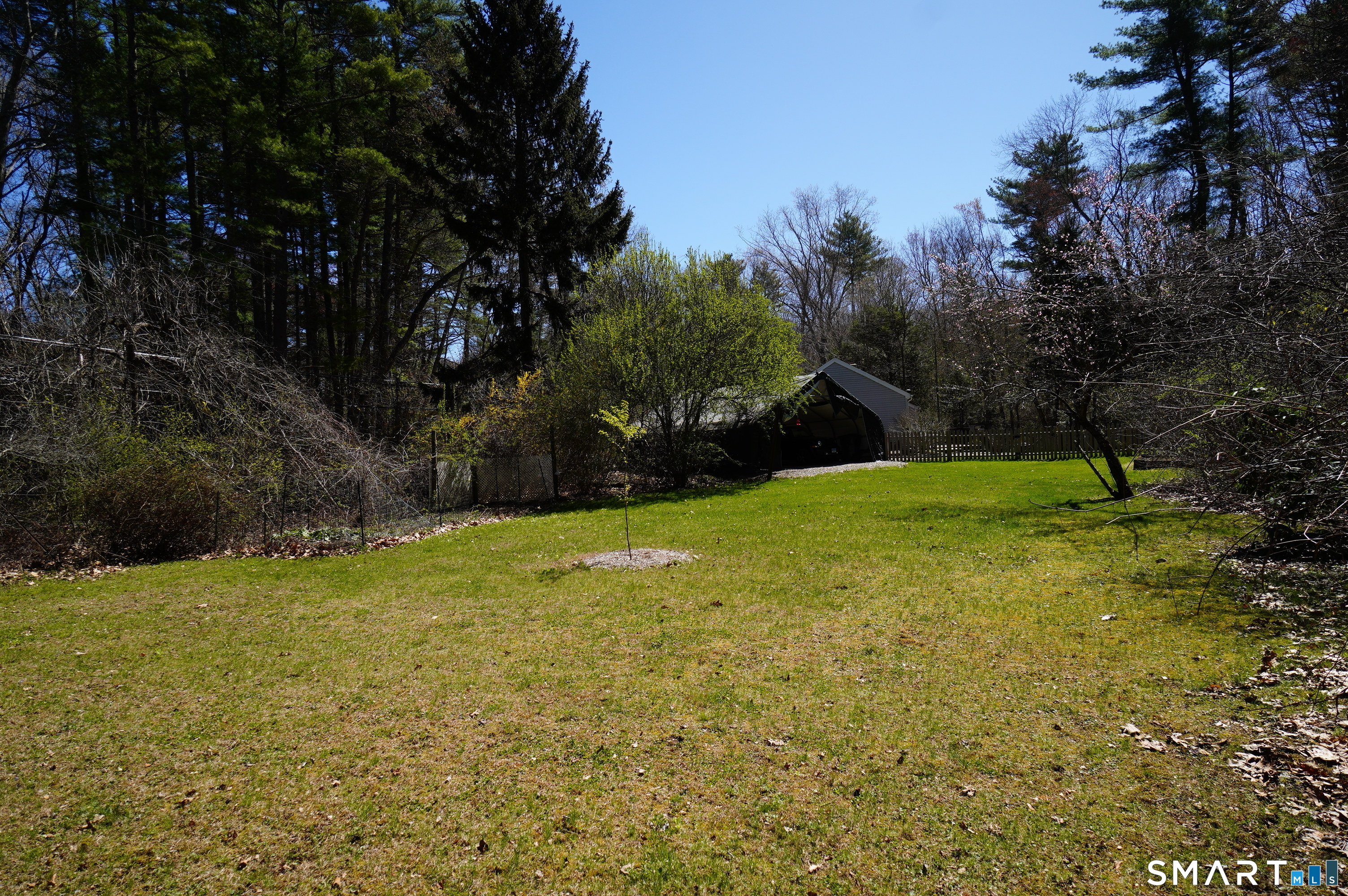 4 Breaults Landing Road Thompson, CT 06277 - Photo 37 of 39 a view of a yard with a tree