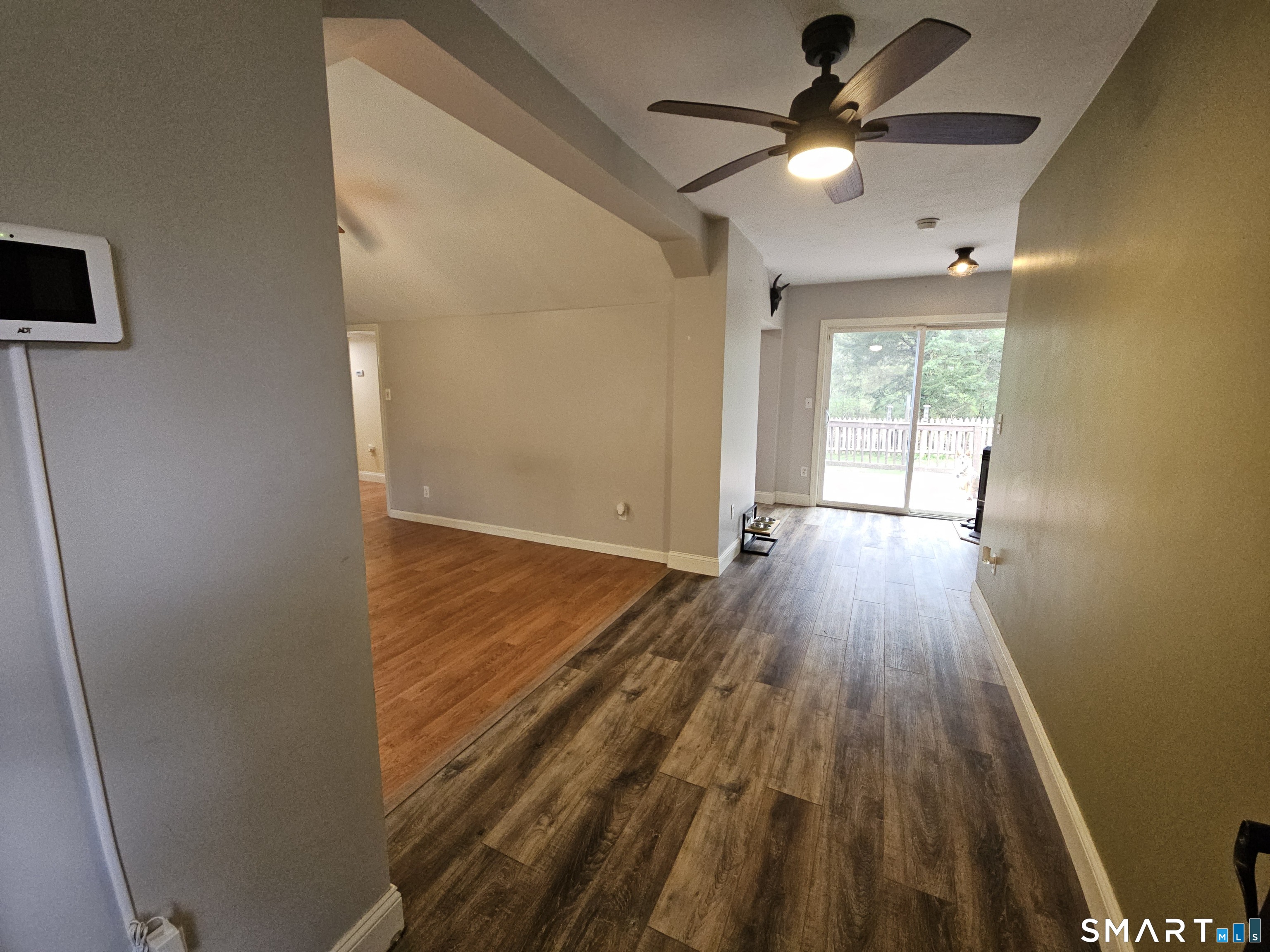 4 Breaults Landing Road Thompson, CT 06277 - Photo 4 of 39 wooden floor in an empty room with a window