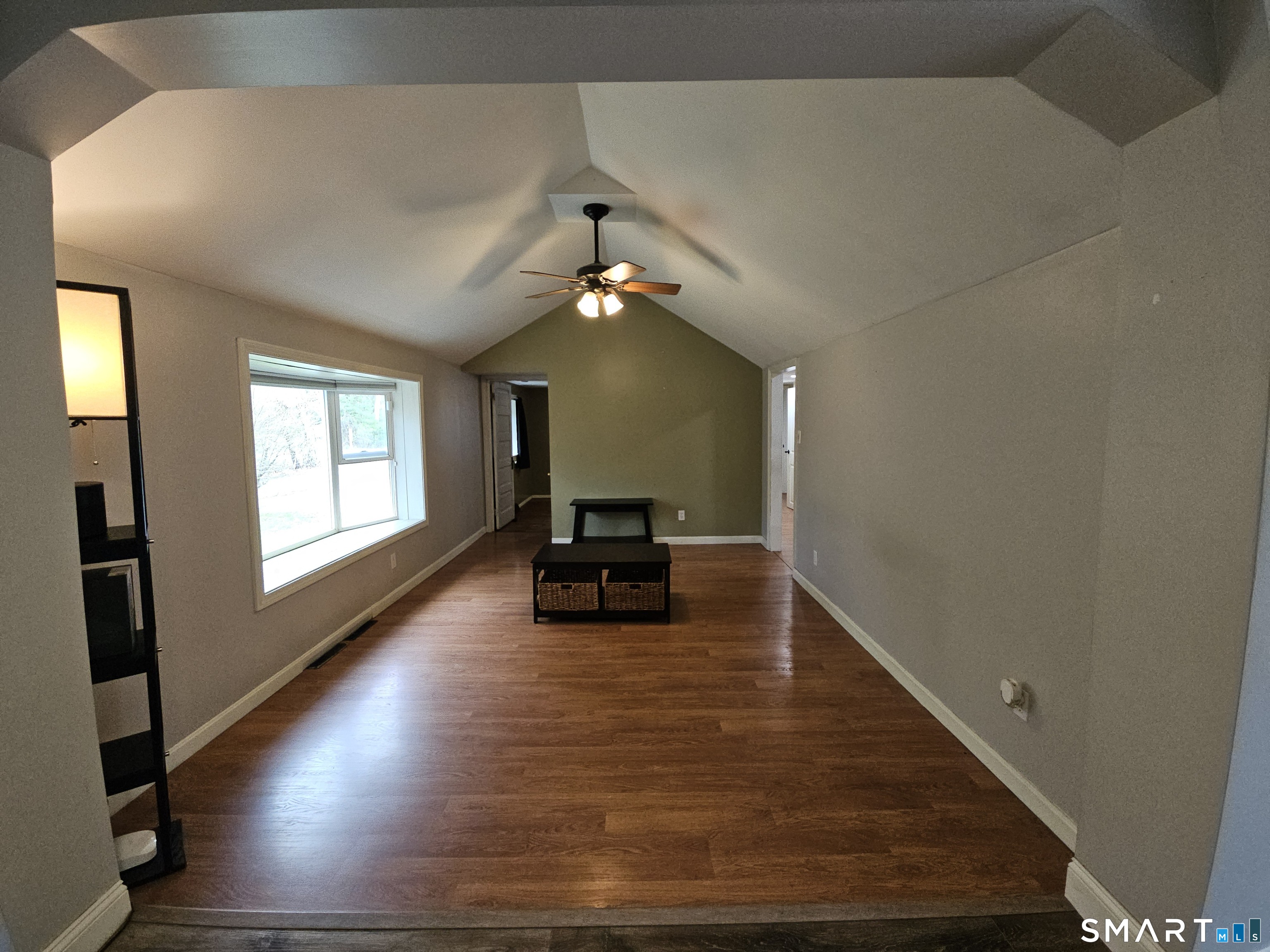 4 Breaults Landing Road Thompson, CT 06277 - Photo 5 of 39 a view of livingroom with hardwood floor and a ceiling fan