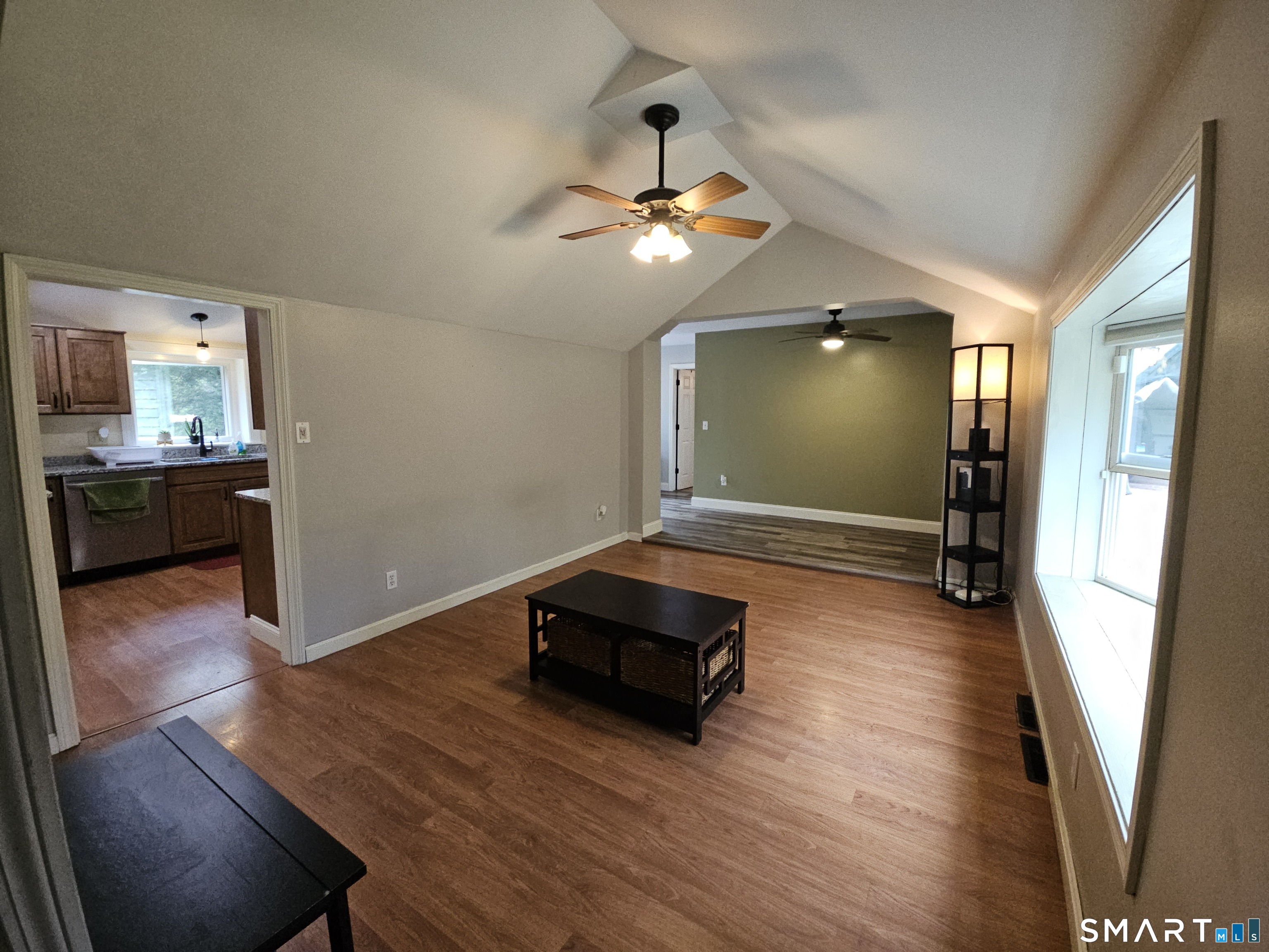 4 Breaults Landing Road Thompson, CT 06277 - Photo 6 of 39 a living room with hard wood floors and a ceiling fan