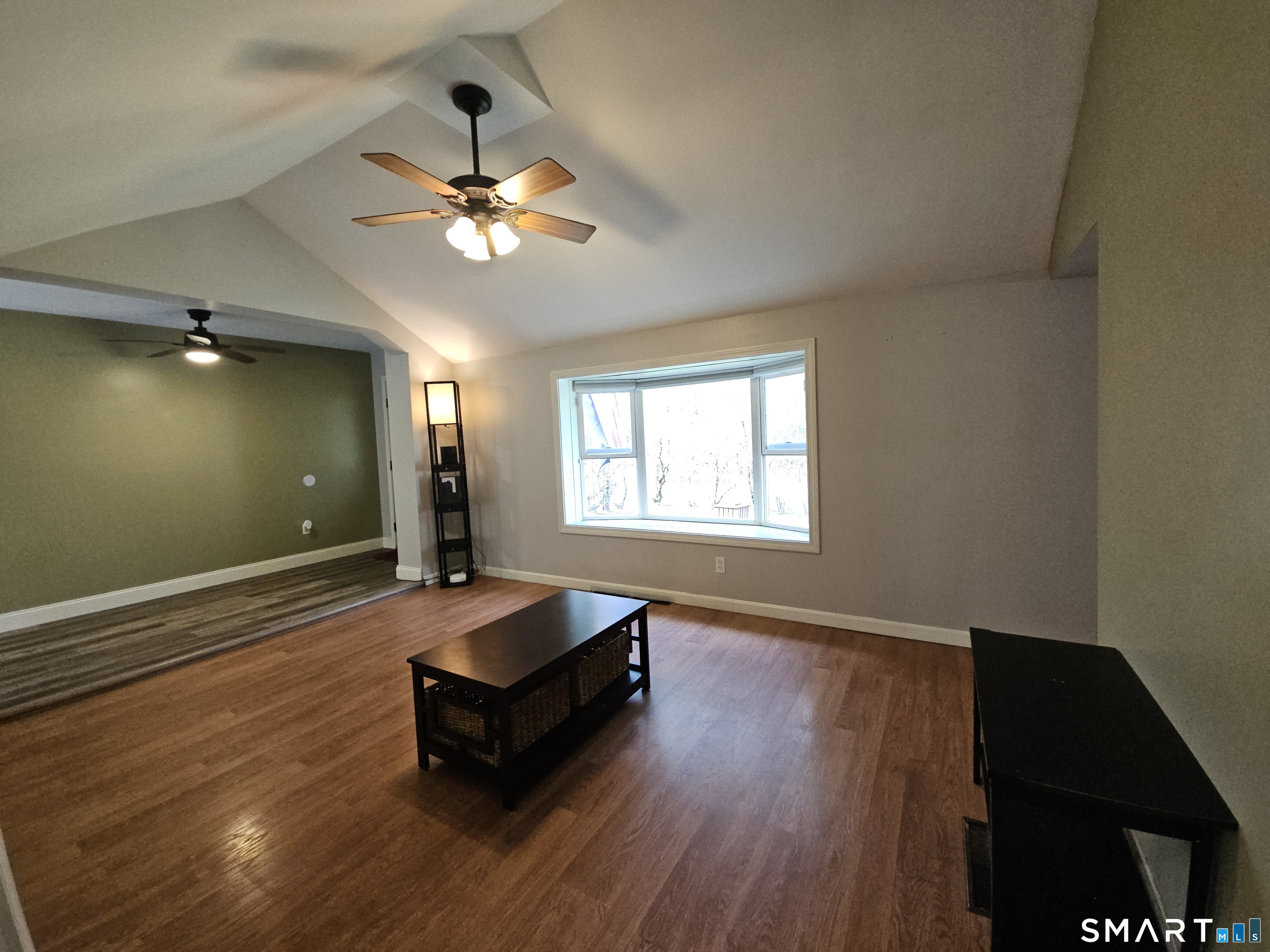 4 Breaults Landing Road Thompson, CT 06277 - Photo 7 of 39 a living room with couch and a window