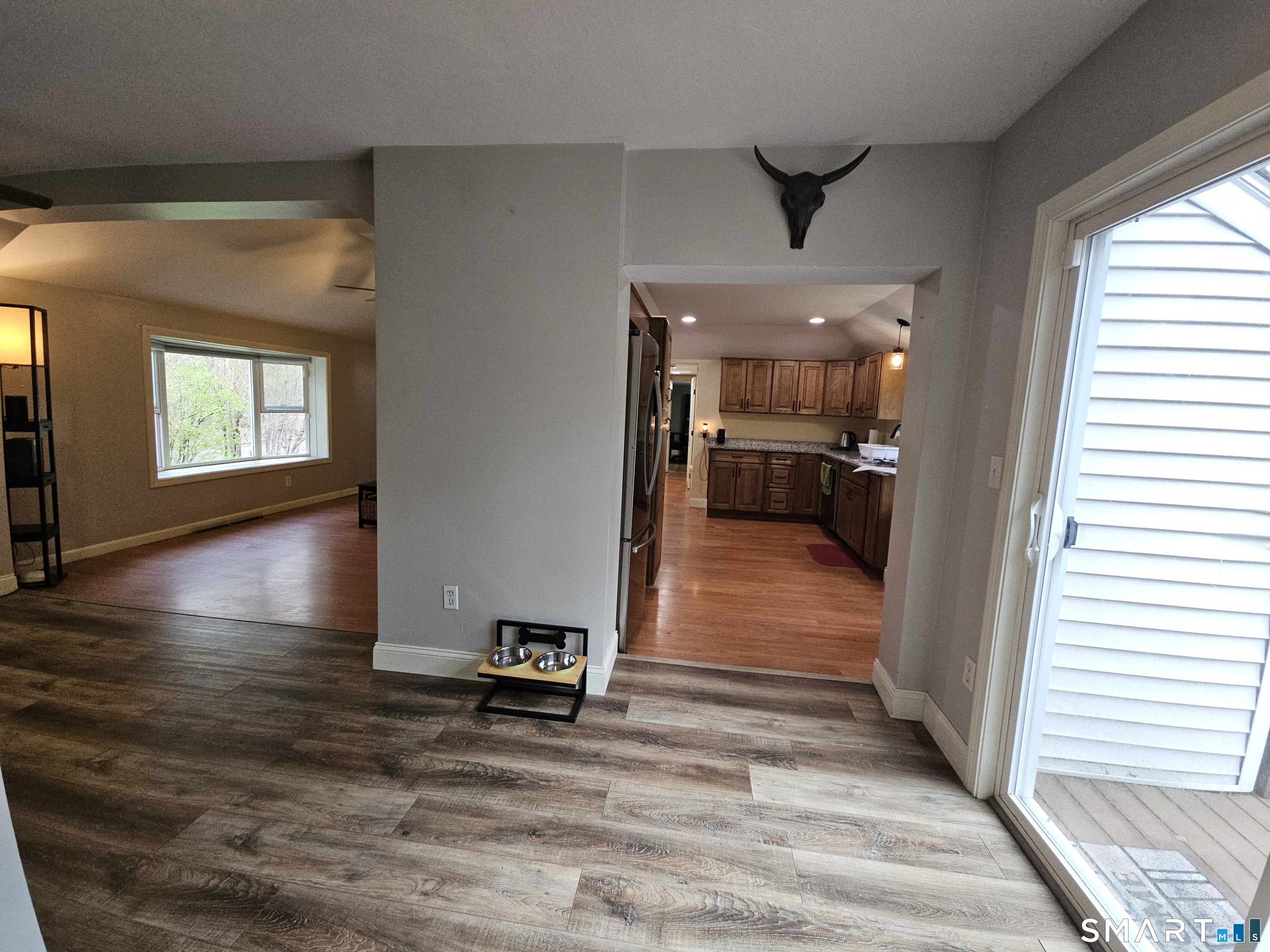 4 Breaults Landing Road Thompson, CT 06277 - Photo 9 of 39 a view of a hallway with wooden floor and windows