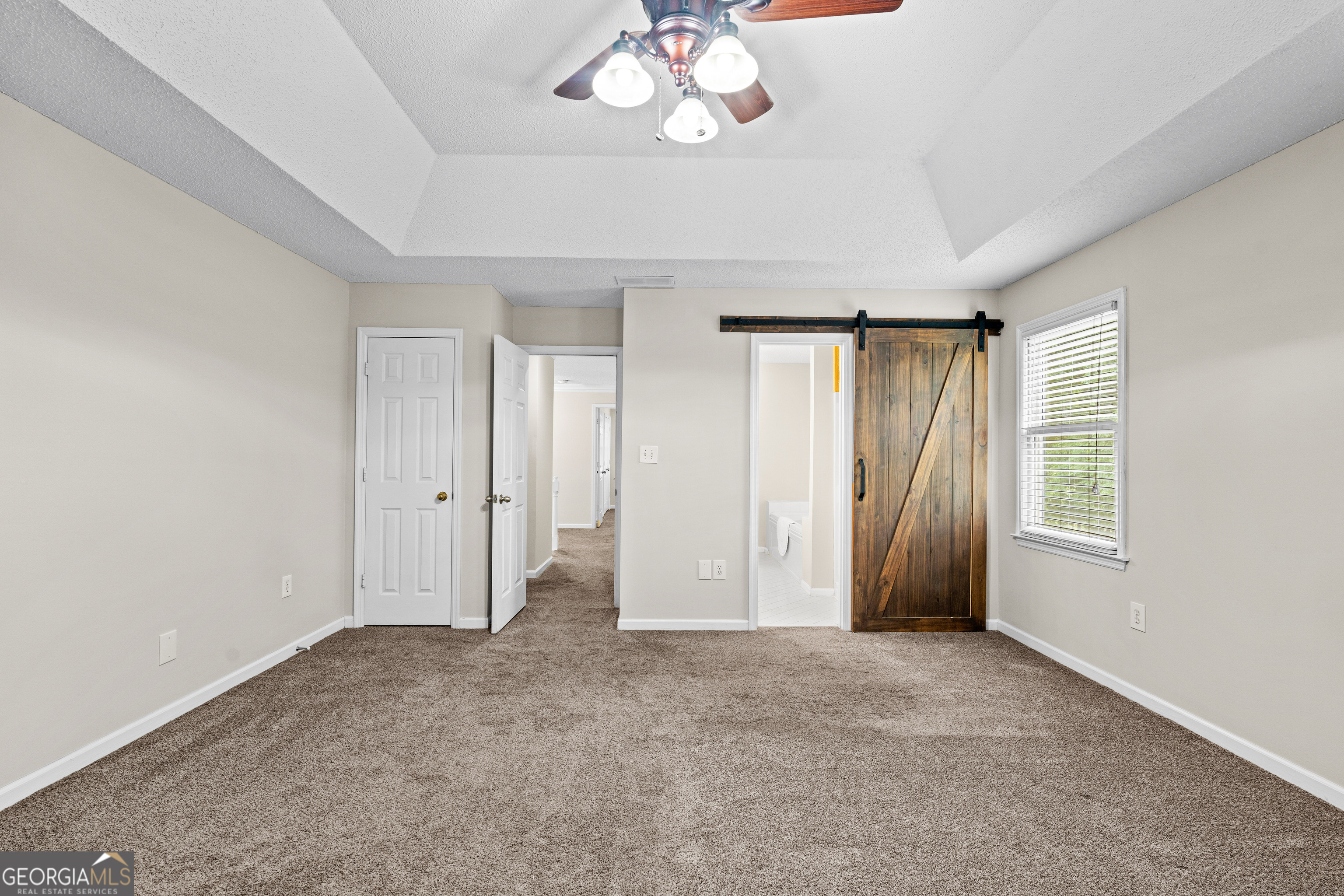 39 Springfield Court Newnan, GA 30265 - Photo 27 of 44 a view of an empty room with a window