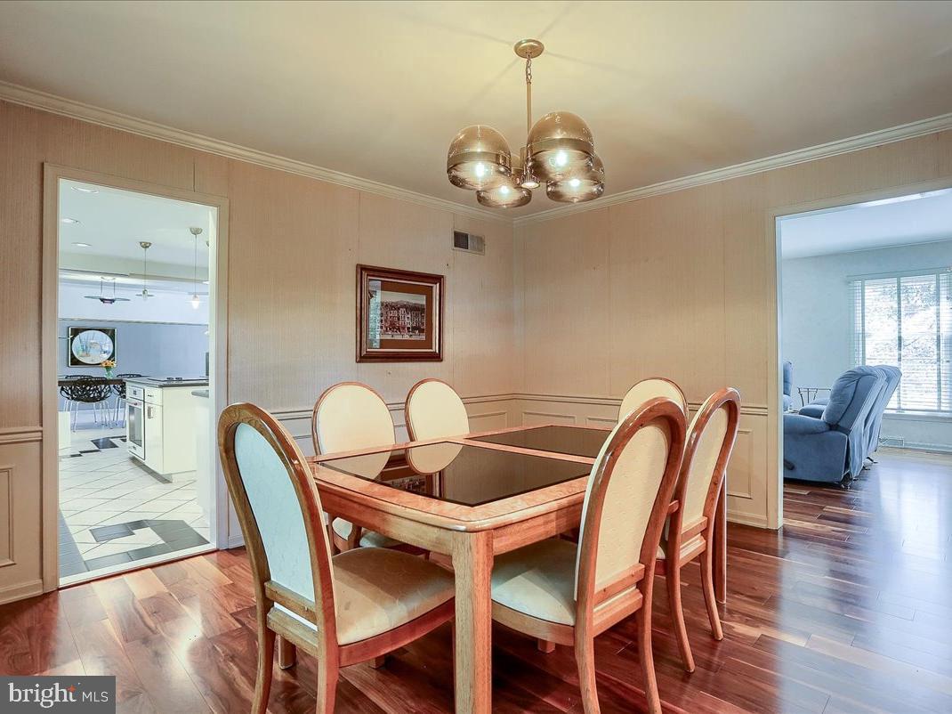 4470 Nantucket Road Harrisburg, PA 17112 - Photo 6 of 26 Formal Dining room with Black Walnut flooring