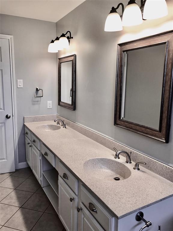 5859 Frankford Road, Unit 803 Dallas, TX 75252 - Photo 13 of 21 a bathroom with a sink double vanity and a mirror