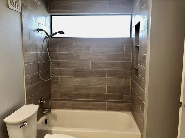 a bathroom with a bathtub