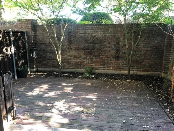 a view of a door and a yard