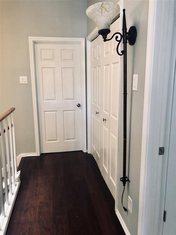 5859 Frankford Road, Unit 803 Dallas, TX 75252 - Photo 10 of 21 a view of a hallway with wooden floor