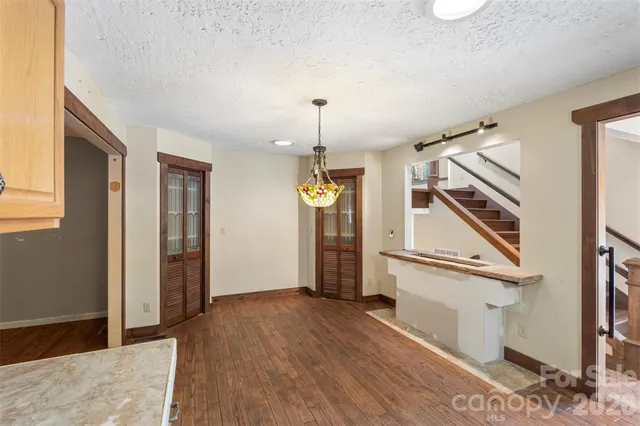 a view of empty room with windows