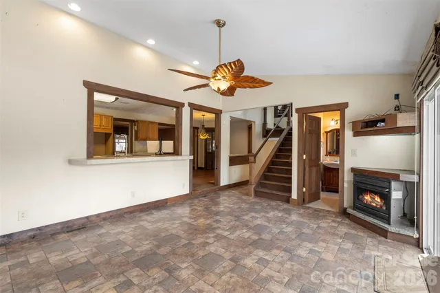 a kitchen with a sink and wooden cabinets